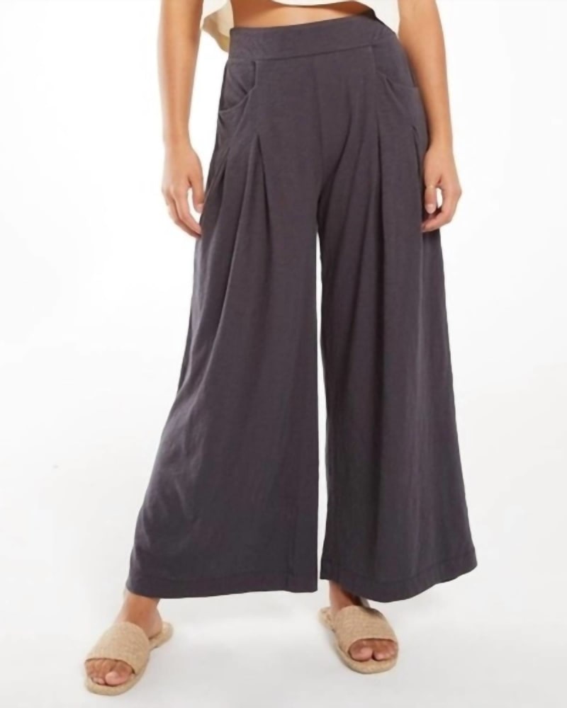 Front of a model wearing a size LARGE Ashton Slub Flare Pant in Dark Grey in Dark Grey by Z Supply. | dia_product_style_image_id:332243